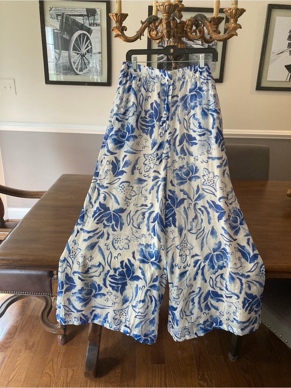 CeCe NWT. Blue and White Floral Wide Leg fully lined pants.